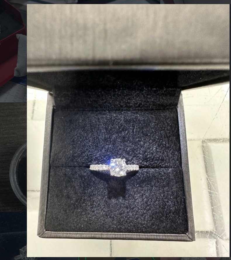 Fancy yellow diamond ring with tapered baguettes